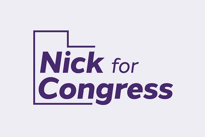 Purple 'Nick for Congress logo' on a cream background