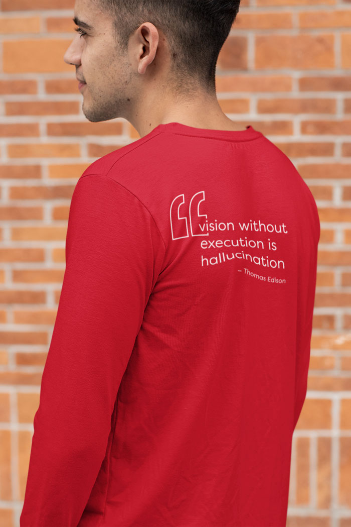 Red shirt with Thomas Edison's quote 'vision without execution is hallucination' on back