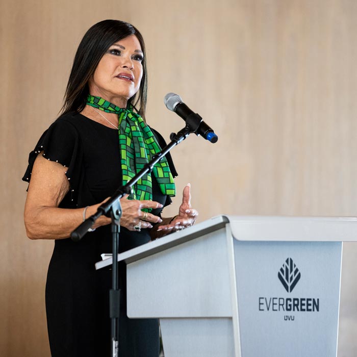 Woman wearing a branded scarf