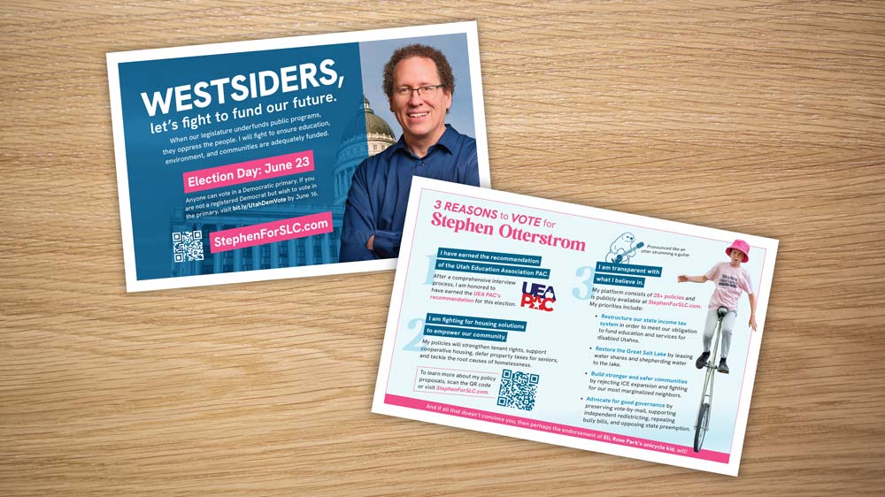 Two postcards with images and text on a table