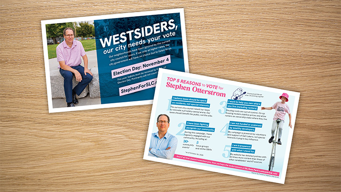 Two postcards with images and text on a table