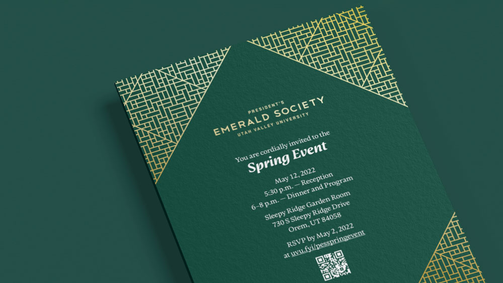 Green invitation with gold details