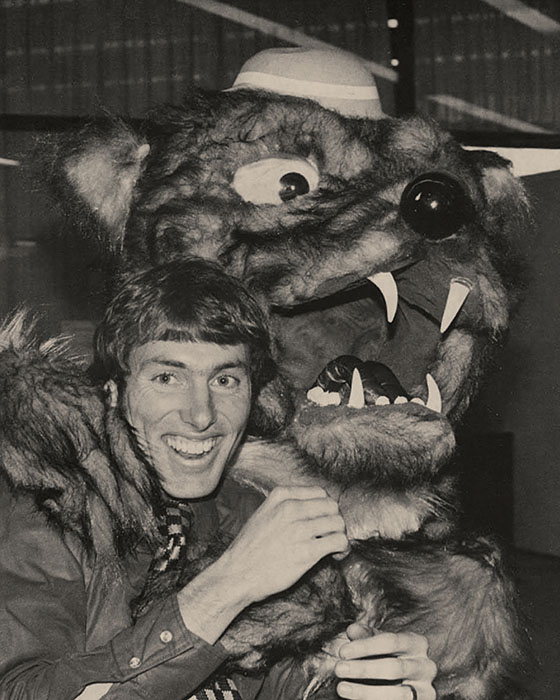 Historic image of student with a mascot costume